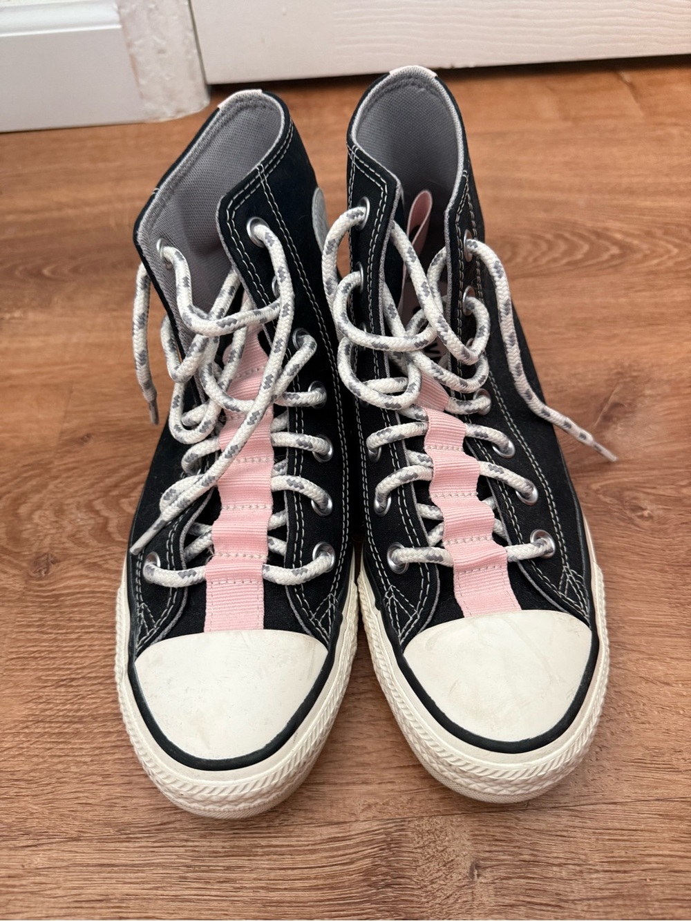 Converse Black High-Top Canvas Sneakers with Pink Tongue Stripe